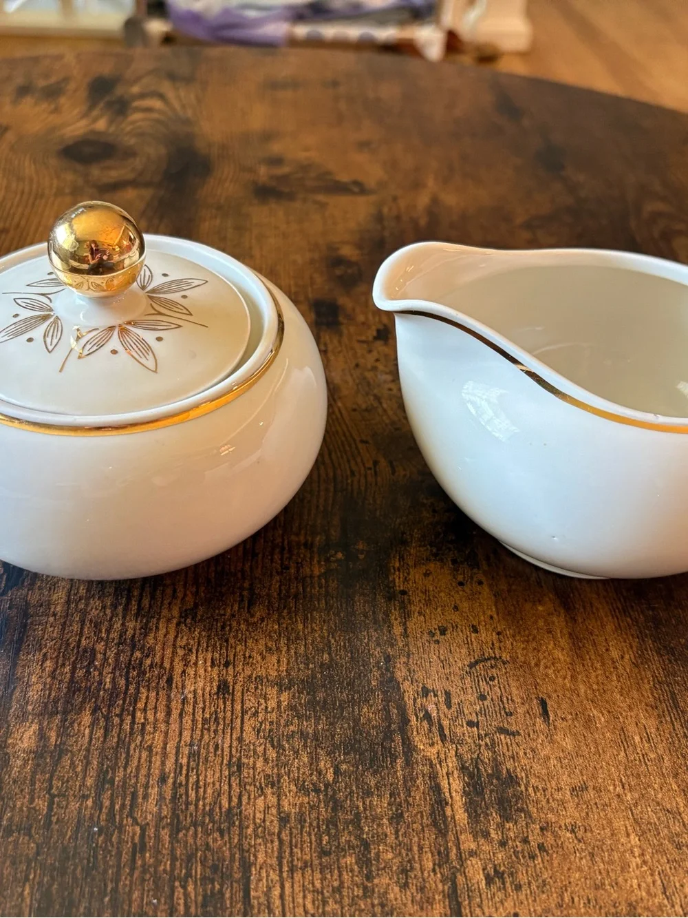 White Ceramic Creamer and Sugar Set with Gold Trim